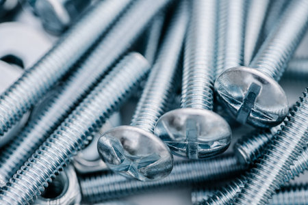 background of new bolts and nuts close-up