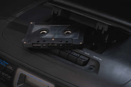 audio tape recorder closeup on black backgroundの写真素材