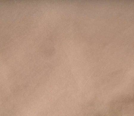 abstract background from brown fabric texture closeupの写真素材