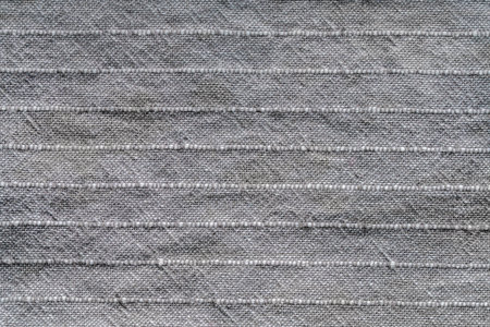 abstract background from gray fabric texture closeup