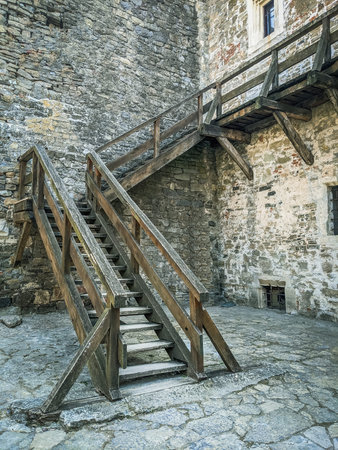 vintage staircase with stone wall, ancient architectureの写真素材