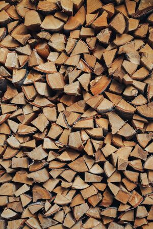 Firewood. Stack of wood logs, wooden abstract backgroundの写真素材