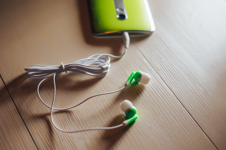 Concept of listening music from smartphone with wireless technology.の写真素材