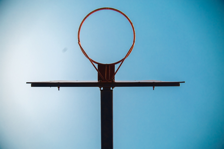 basketball hoop viewed from below,focus on red zoneの写真素材