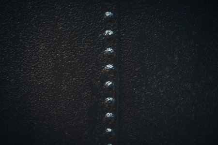 Riveted metal background, detail metal textured background from aircraft. Old grunge metal fragment...