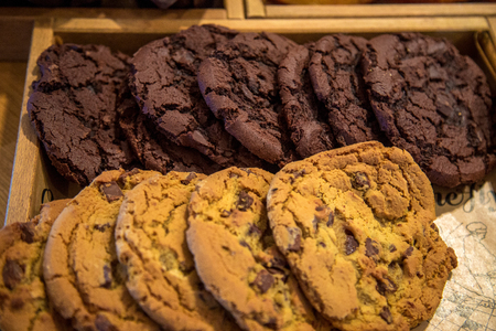 Closeup of a group of assorted cookies. Chocolate chip, oatmeal raisin, white chocolate fill the frame.の写真素材