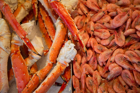 Shrimp and other seafood at the fish market in Bergen, Norwayの写真素材