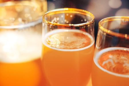 a pitcher and two glasses of beer in cafeの写真素材