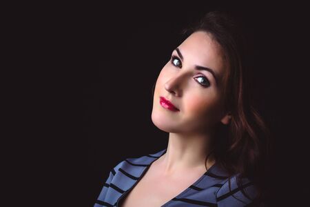 Portrait of young beautiful woman with stylish make-upの写真素材