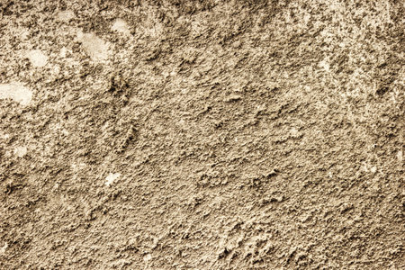 Tapping on a contact surface of old plaster walls.の写真素材