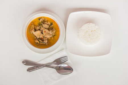 Pork  Curry with rice served with delicious Thai food.の写真素材