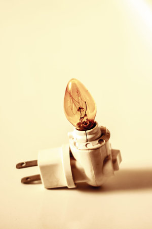 Laid bare light bulb does not turn up on the floor.
