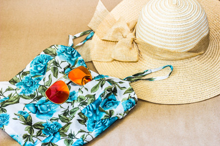 Cloth basket on a blue cloth hat and sunglasses fashion for women.