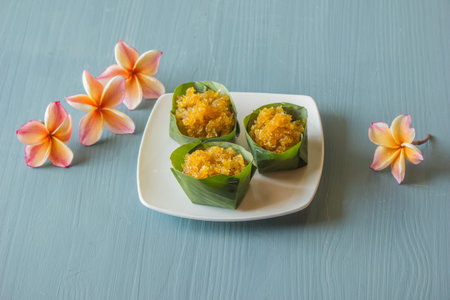 Stir-fried pineapple with banana leaves placed in a plate ready to serve.