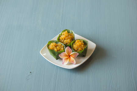 Stir-fried pineapple with banana leaves placed in a plate ready to serve.の写真素材