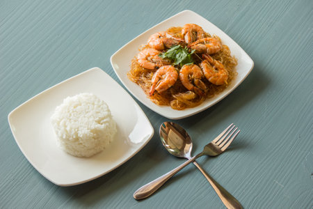 Thai food, baked shrimp, glass noodles with a plate of riceの写真素材