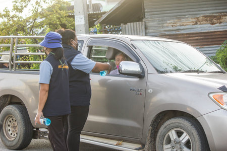 Ratchaburi, Thailand - Aug10 : Covid-19 prevention screening service For the people, both merchants...
