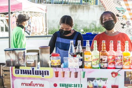 RATCHABURI, THAILAND - AUGUST 10: The epidemic of covids is severe. Sellers will wear masks to prevent infection in the market on August 10, 2021 in Ratchaburi, Thailand.のeditorial素材