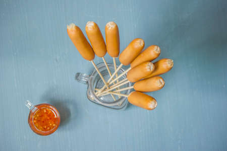 Cooked Smoked Chicken Sausage Skewersの写真素材