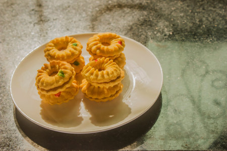 Butter cookies decorated with dried fruitの写真素材