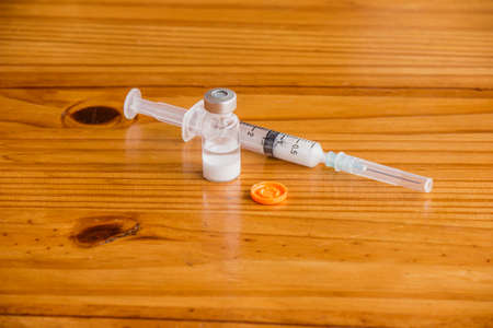 Syringe with medicine bottleの写真素材