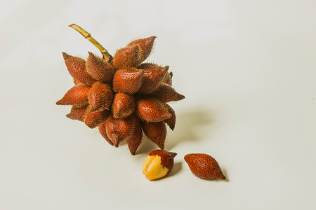 Snake fruit is a sweet and sour fruit. Thai fruit on a white backgroundの写真素材