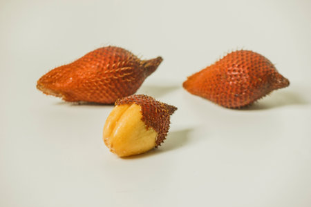 Snake fruit is a sweet and sour fruit. Thai fruit on a white backgroundの写真素材