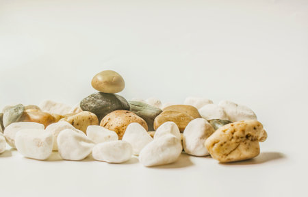 Pile of stones isolated on a white background.の写真素材