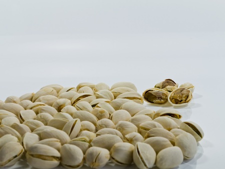 Pistachio Nuts on White Backgroundの写真素材