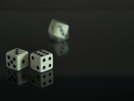 Two dice and one is dicingの写真素材