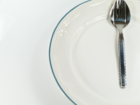 Spoon and Fork as Clock at Lunch Timeの写真素材