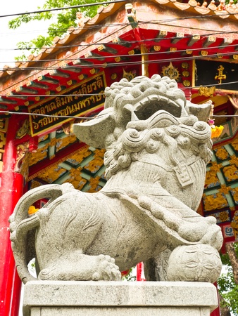 Stone lion and Chinese pavilionの写真素材
