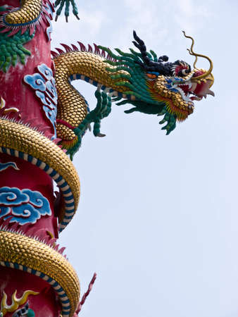 Dragon statue on the post in templeの写真素材