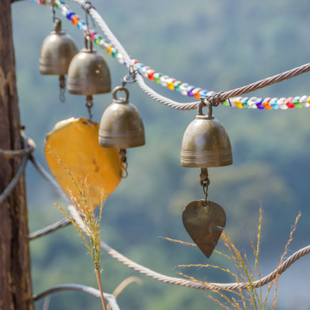 Metal small bells are hanging