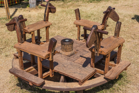 Wooden horse, antique roundabout in local playground in Thailandの写真素材