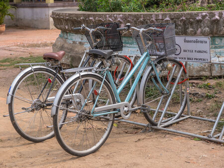 Two bicycles are parking in parking lotのeditorial素材