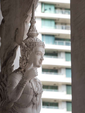 Angel statue in Buddhist temple act thumb upの写真素材