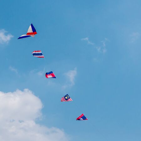 International Asian flags kite on skyの写真素材