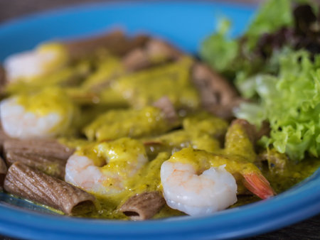 Whole wheat pasta with shrimp green sauceの写真素材
