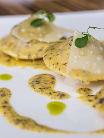 Ravioli in creamy truffle sauceの写真素材