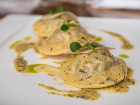 Ravioli in creamy truffle sauceの写真素材