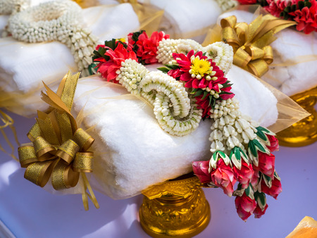 Lei of flowers for worship in Buddhist wayの写真素材