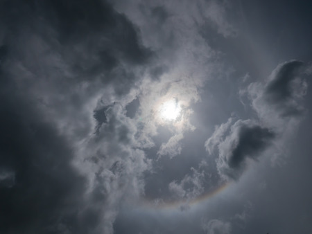 Sun halo on blue sky background, natural phenomenonの写真素材