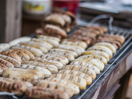 Roasted banana on grill in Thai local marketの写真素材