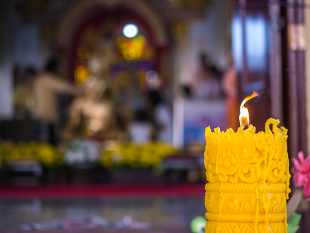 Light the candle in Buddhist templeの写真素材