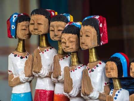 Long neck Karen tribe wood doll in Thailandの写真素材