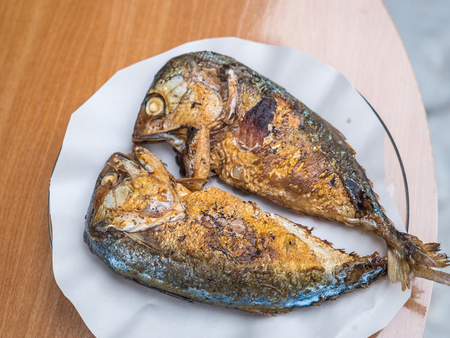 Fried mackerel fish on plateの写真素材
