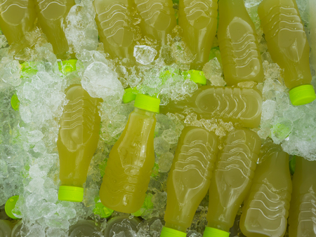Fresh sugar cane juice in ice, cold fruit juiceの写真素材