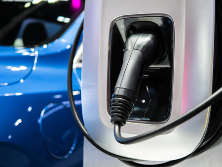Electric car battery charging at power station