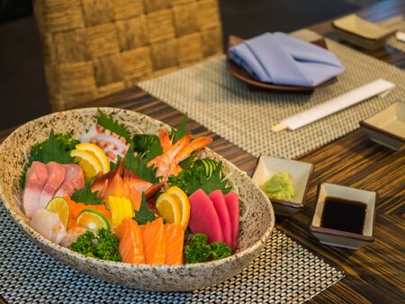 Mixed fresh sashimi set with wasabi and shoyu sauceの写真素材
